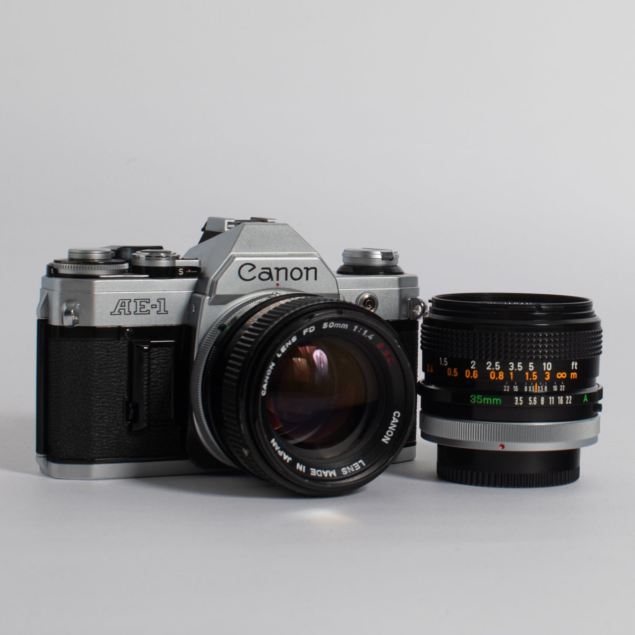 Canon AE-1 with 50mm f/1.4 and 35mm f2.8 lenses – Film Supply Club