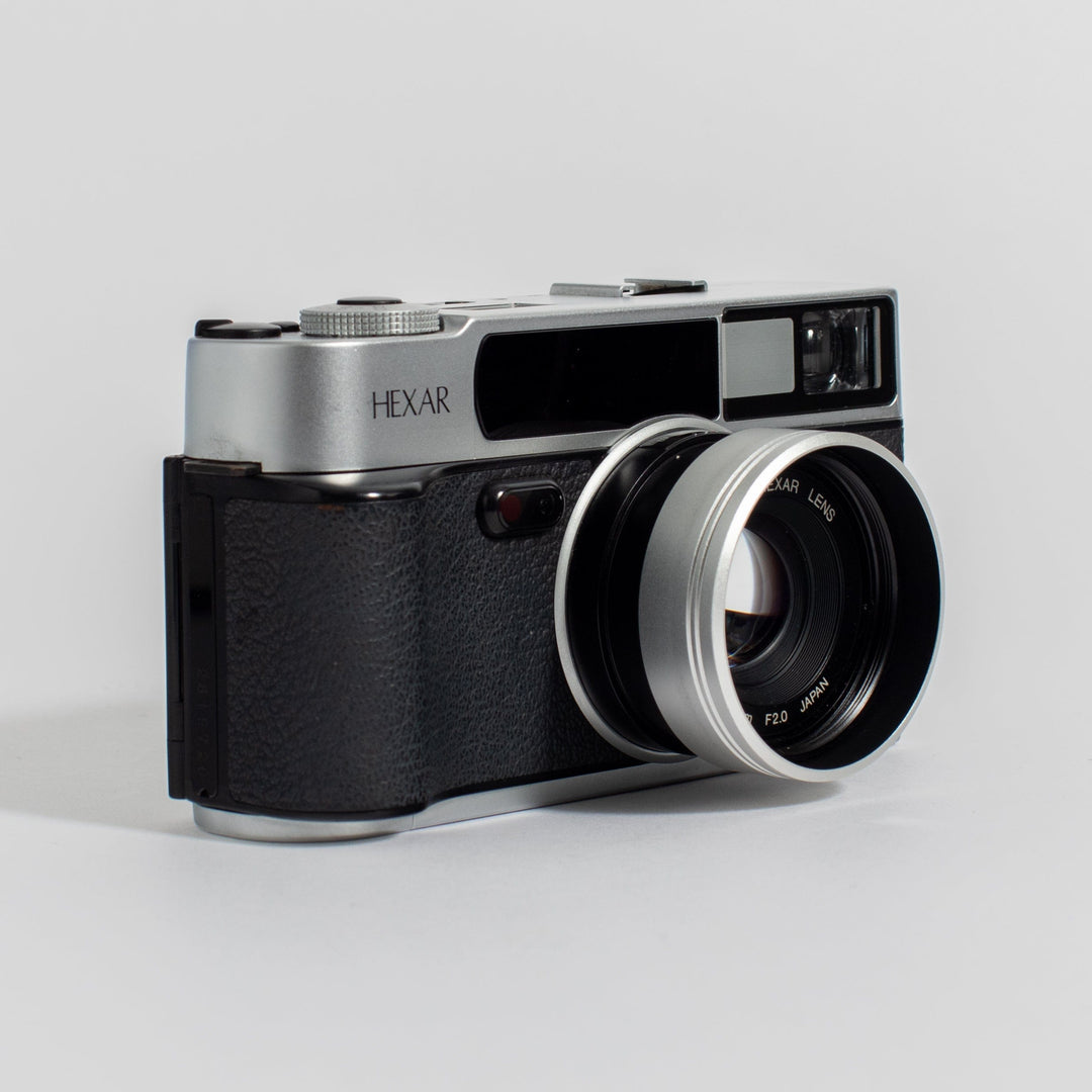 Konica Hexar Silver with 35mm f2 lens, leather case, and strap