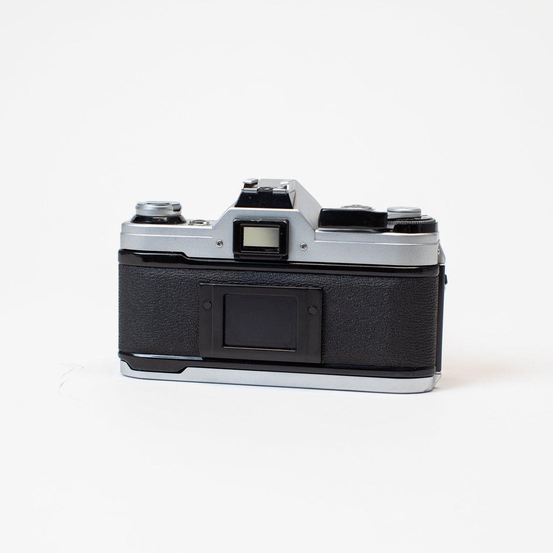 Canon AE-1 Program with 50mm f/1.8 FD Lens no. 1561066