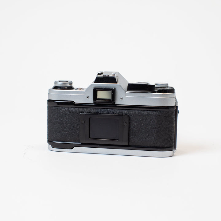 Canon AE-1 Program with 50mm f/1.8 FD Lens no. 1561066