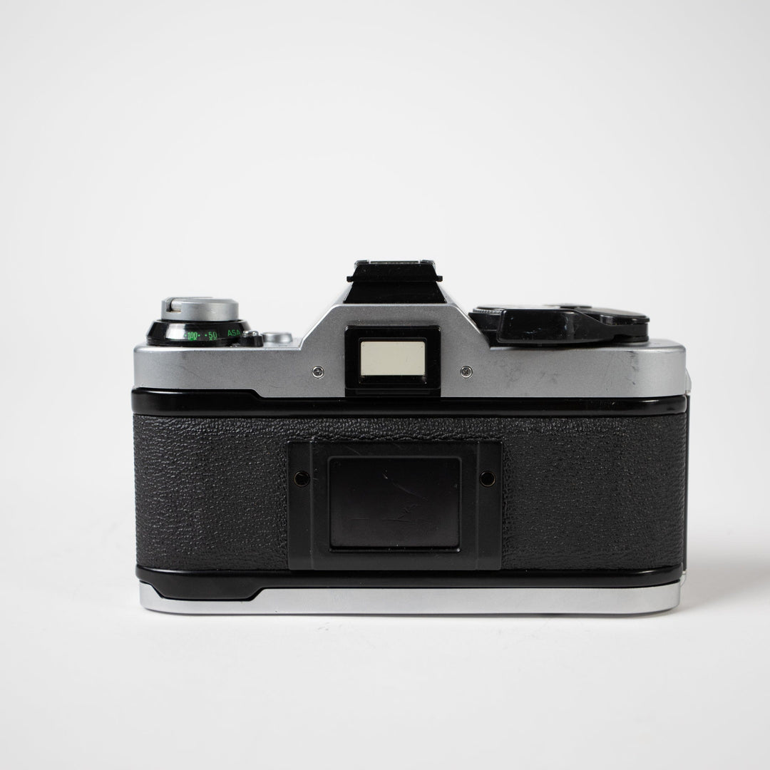 Canon AE-1 Program with 50mm f/1.8 FD Lens, body no. 3044489