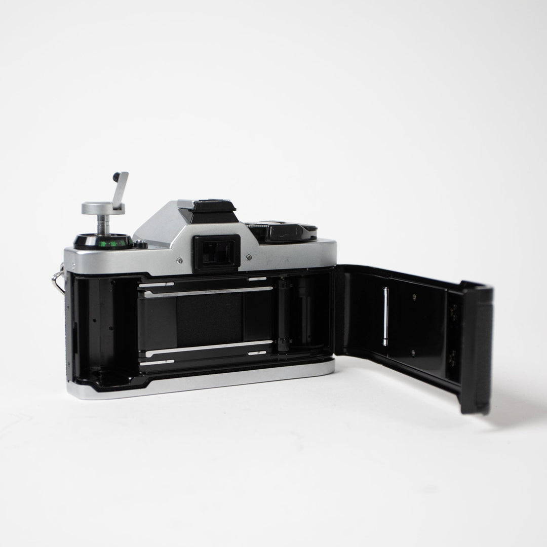 Canon AE-1 Program with 50mm f/1.8 FD Lens, body no. 3044489