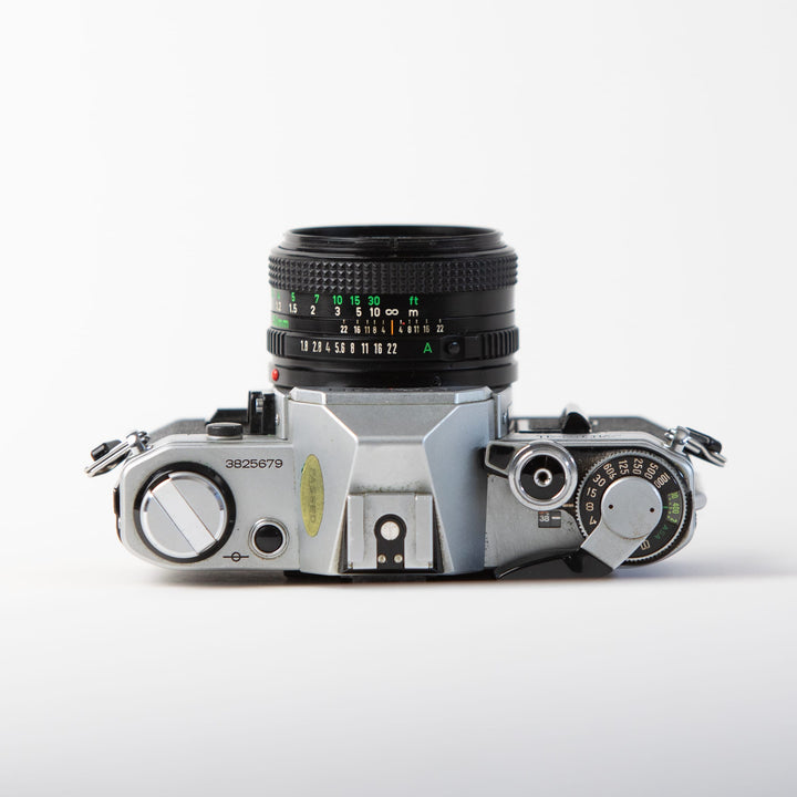 Canon AE-1 with 50mm FD f/1.8, body 3825679