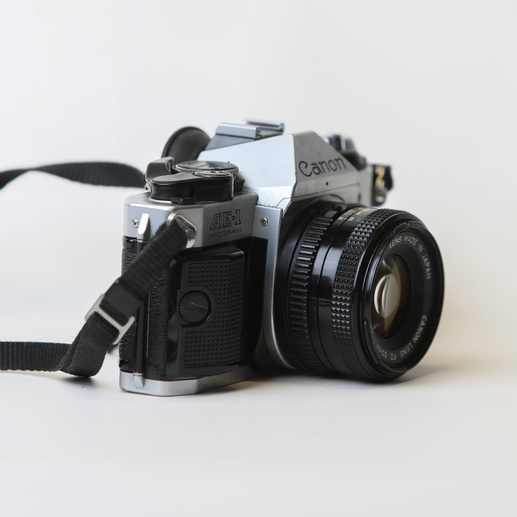 Canon AE-1 Program with 50mm f/1.8 FD Lens, body no. 4666529
