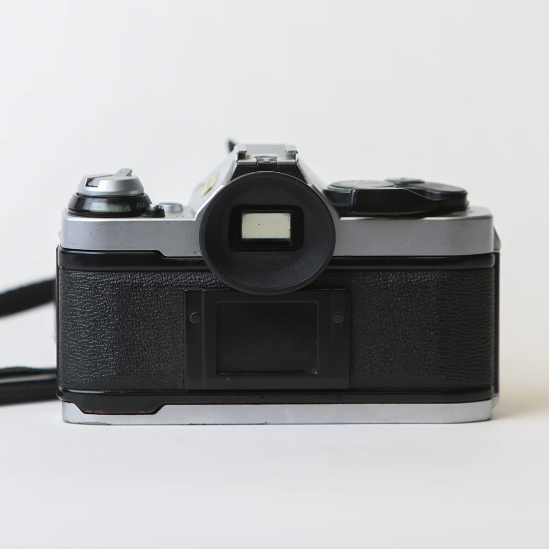 Canon AE-1 Program with 50mm f/1.8 FD Lens, body no. 4666529