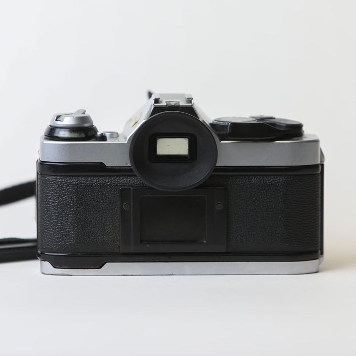 Canon AE-1 Program with 50mm f/1.8 FD Lens, body no. 4666529