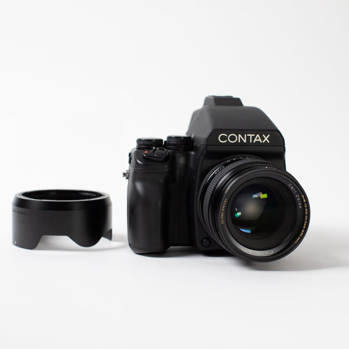 Contax 645 with 80mm Carl Zeiss Planar f/2, brightened finder, lens hood