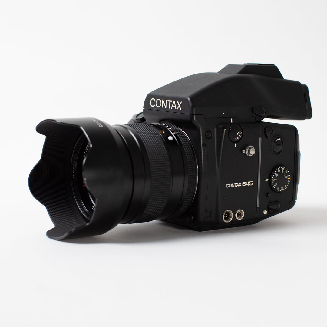 Contax 645 with 80mm Carl Zeiss Planar f/2, brightened finder, lens hood