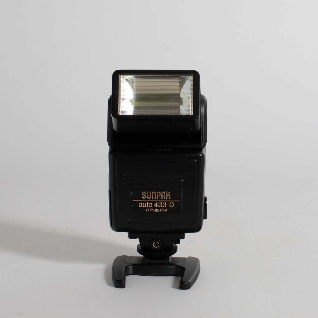 Flash auto-réfléchissant Sunpak auto 433D à thyristors dédiés pour appareils photo reflex argentiques Nikon - Canada Flash auto-réfléchissant Sunpak auto 433D à thyristors dédiés pour appareils photo reflex argentiques Nikon - Canada