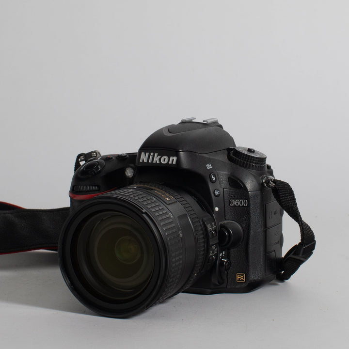 Used Nikon D600 Digital Full-Frame SLR with short zoom lens