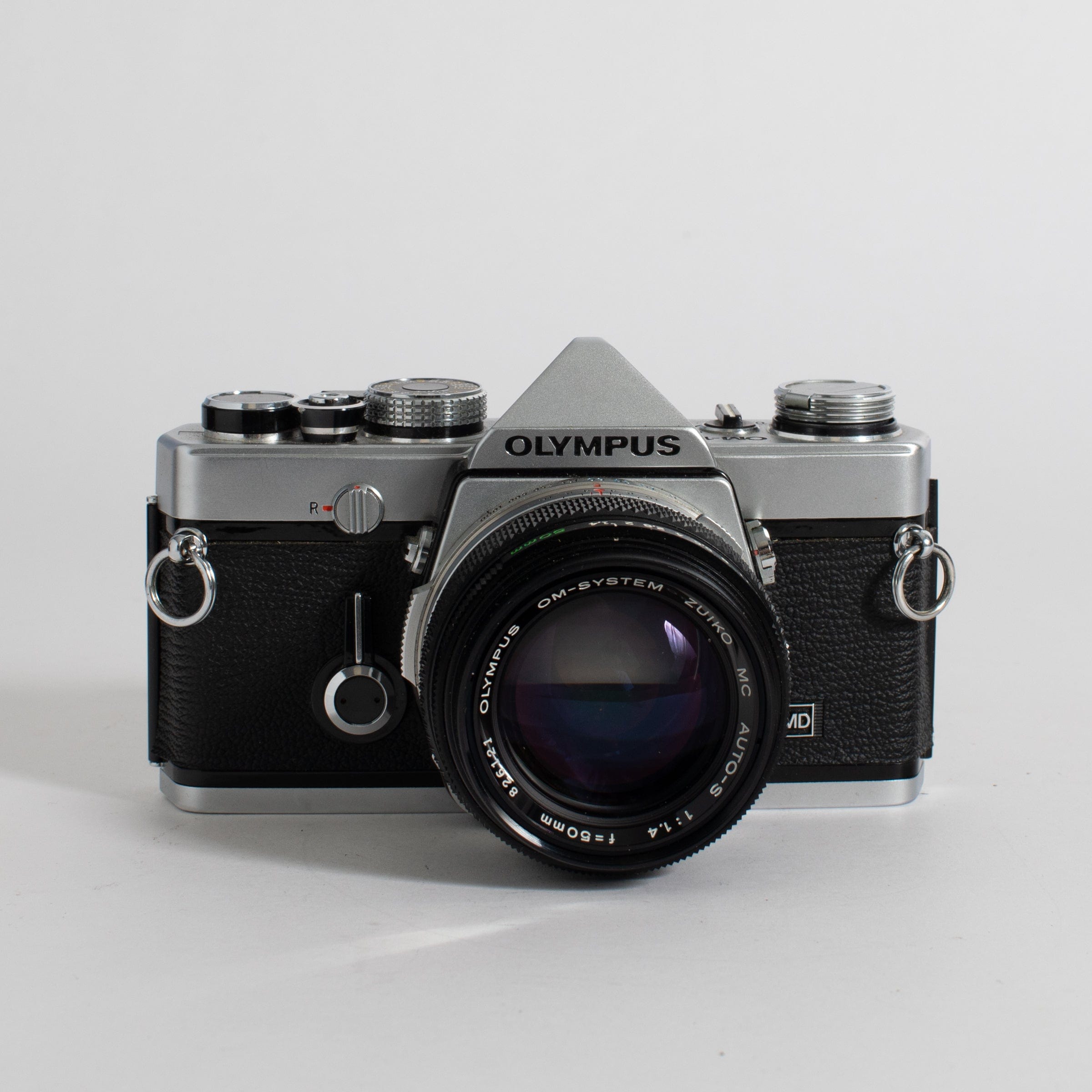 Olympus OM-1 with 50mm f/1.4 lens and leather case (film tested) – Film  Supply Club