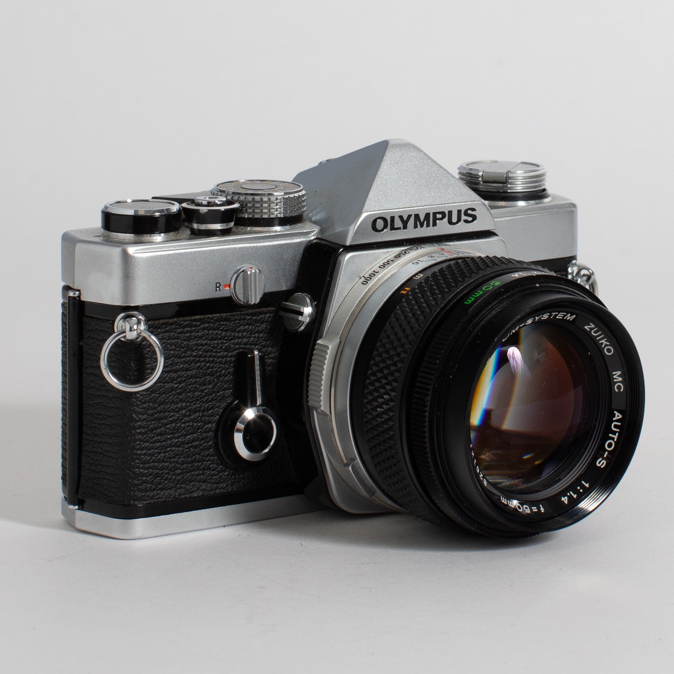 Olympus OM-1 with 50mm f/1.4 lens and leather case (film tested) – Film  Supply Club