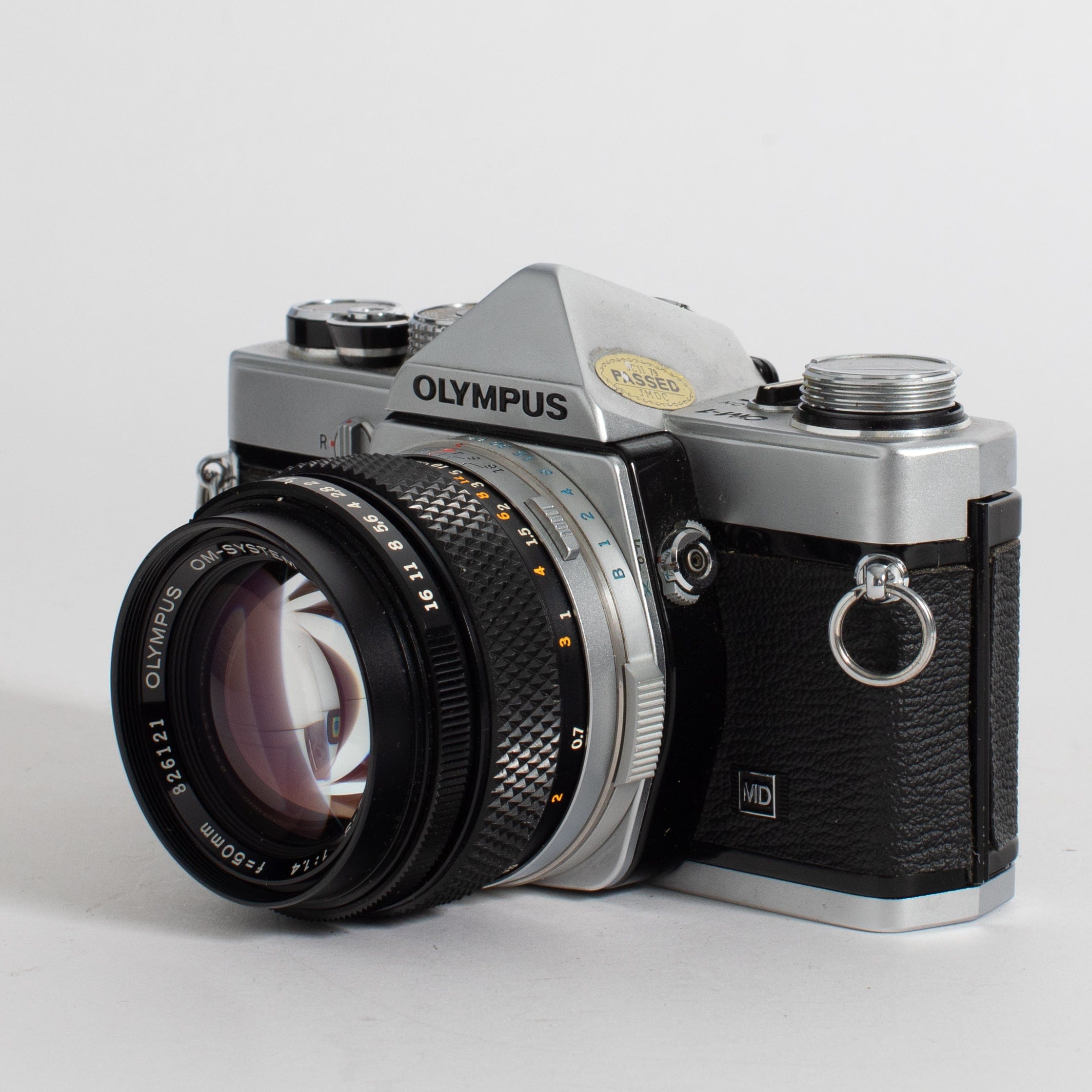 Olympus OM-1 with 50mm f/1.4 lens and leather case (film tested) – Film  Supply Club