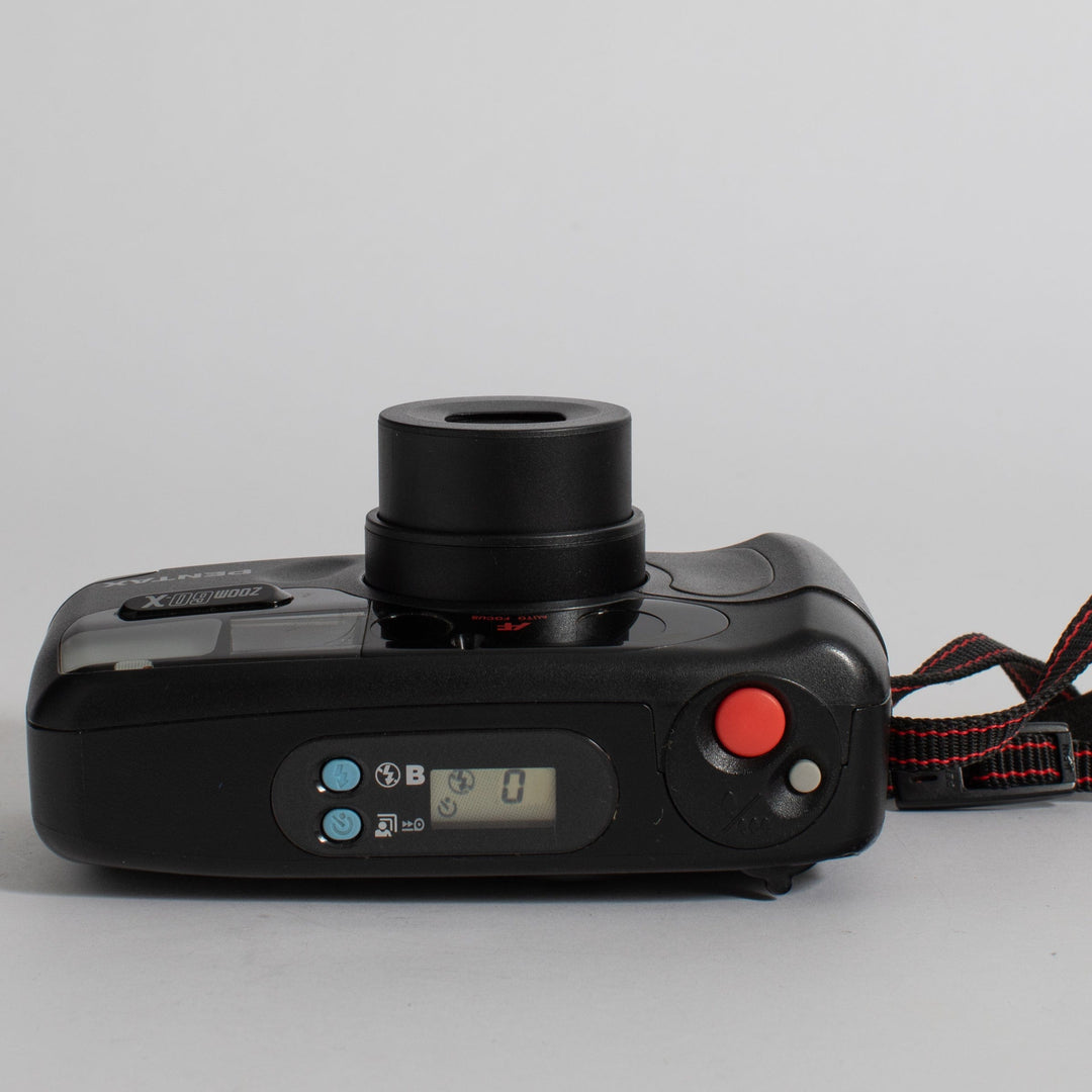 Pentax Zoom 60-X with strap