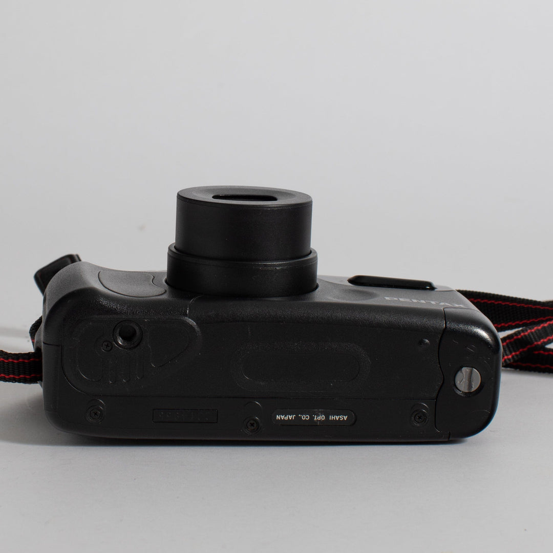 Pentax Zoom 60-X with strap