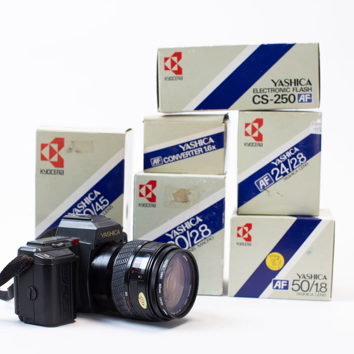 Yashica 230-AF with multiple lenses and original boxes