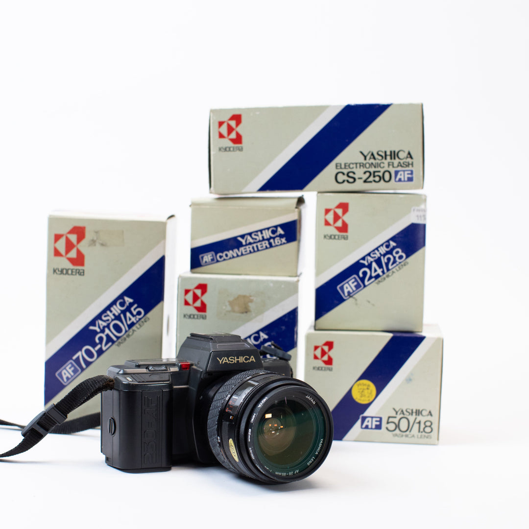 Yashica 230-AF with multiple lenses and original boxes