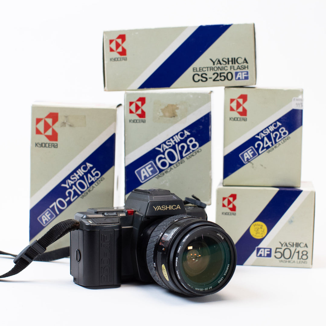 Yashica 230-AF with multiple lenses and original boxes