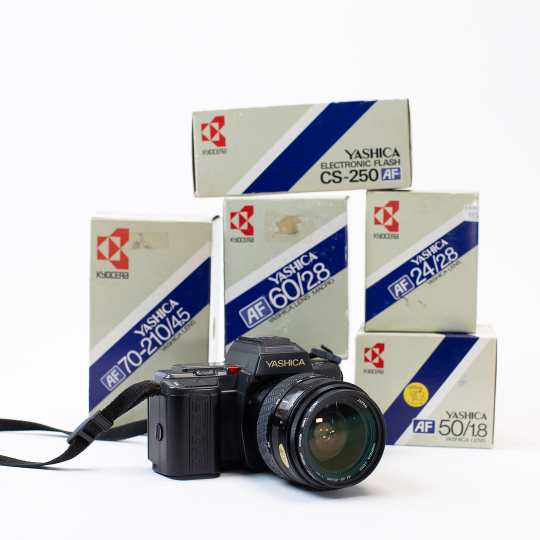 Yashica 230-AF with multiple lenses and original boxes