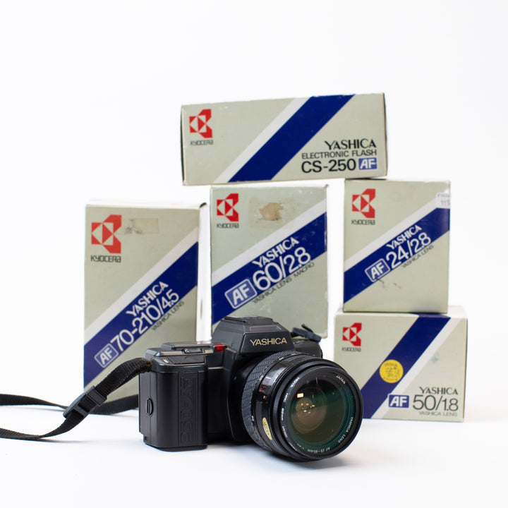 Yashica 230-AF with multiple lenses and original boxes