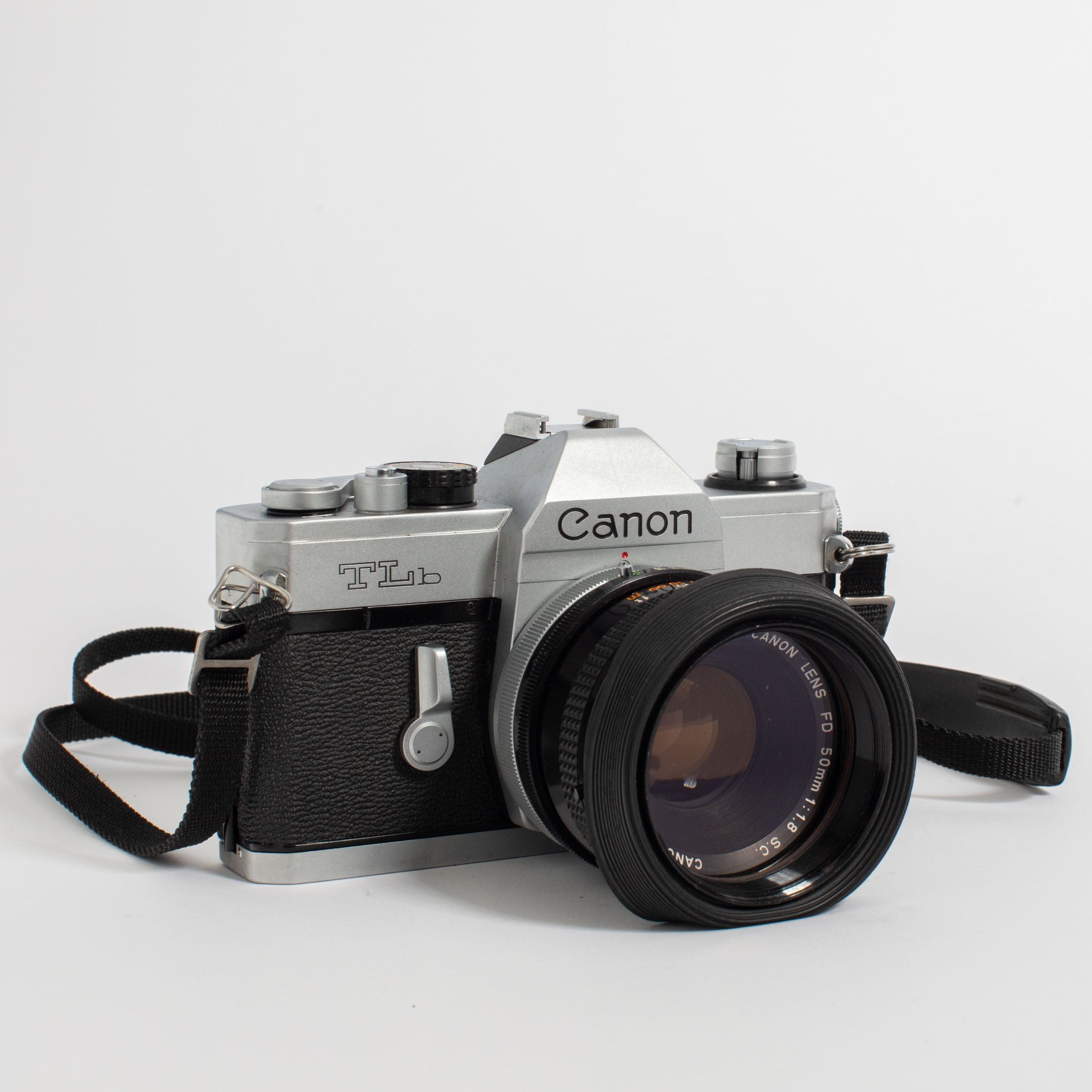 Canon TLb w/ FD 50mm 1.8 S.C. lens and original Canon case – Film