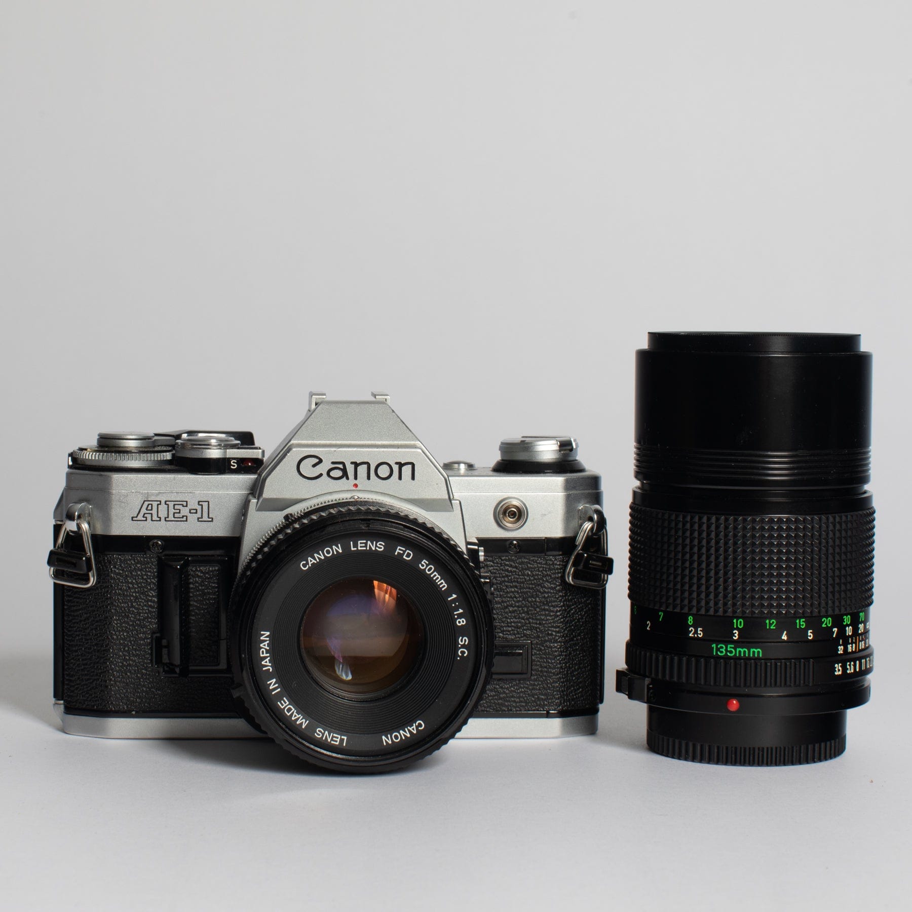 Canon AE-1 w/ 50mm FD f/1.8 & 135mm FD f/3.5 Lens – Film Supply 