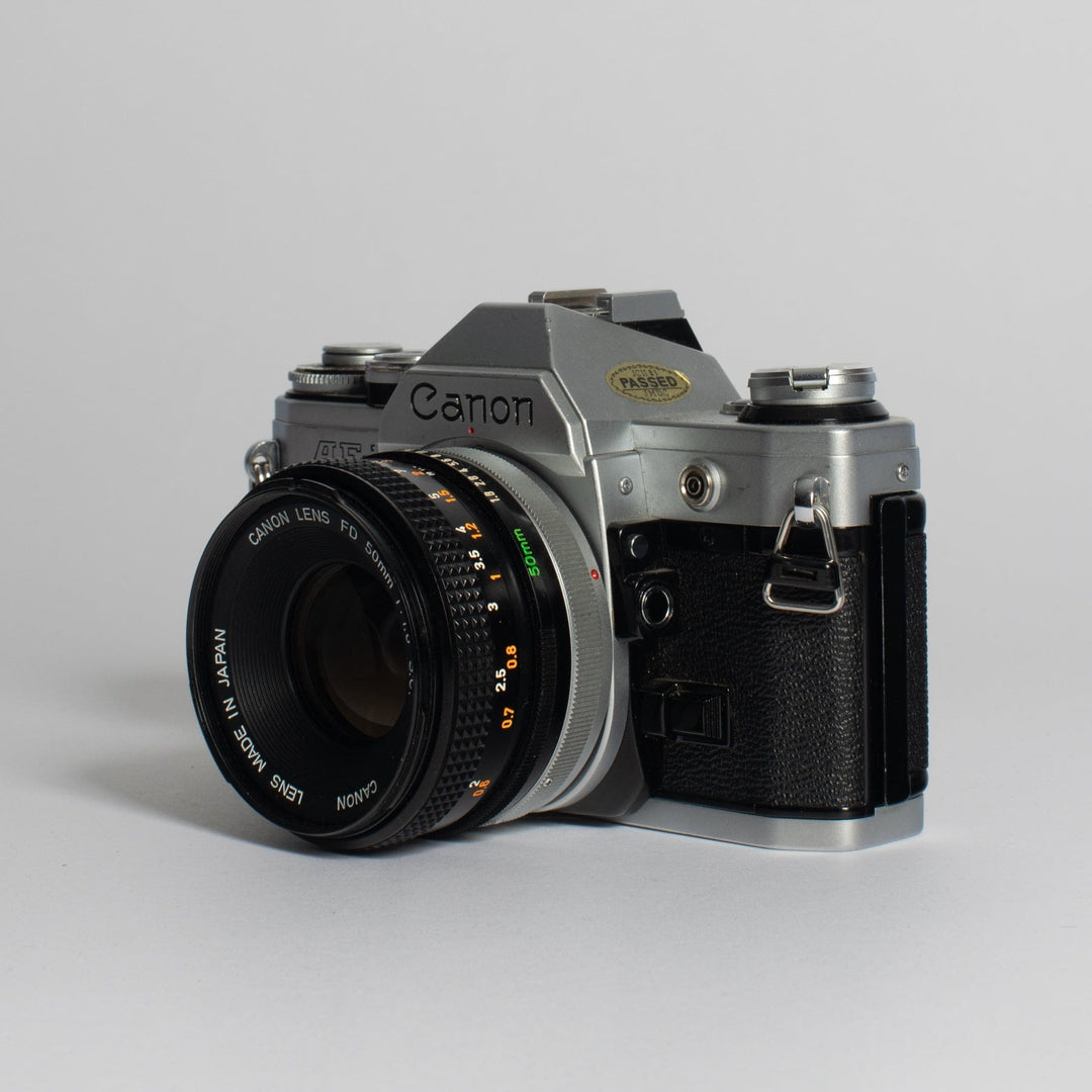 Canon AE-1 w/ 50mm FD f/1.8 & 135mm FD f/3.5 Lens