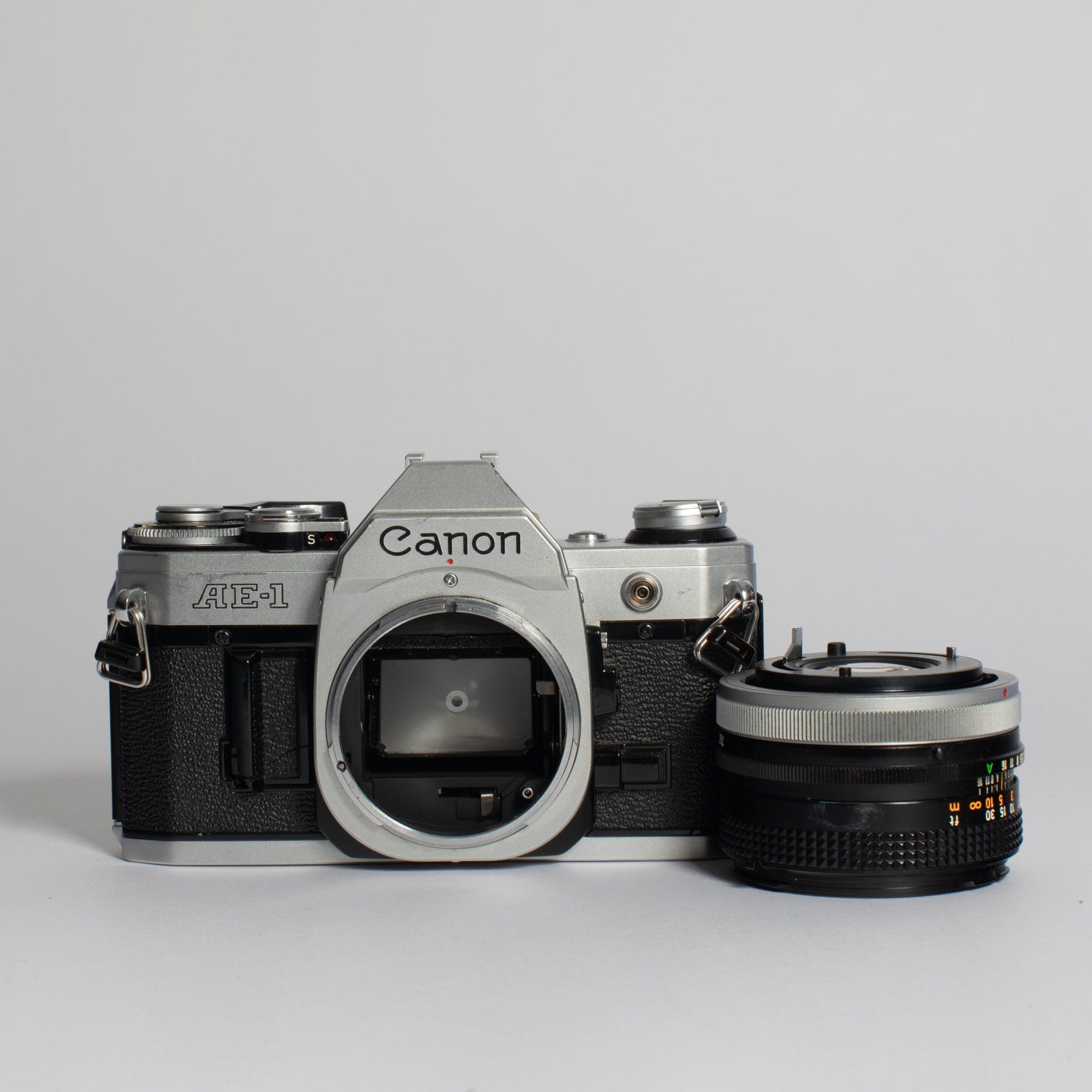 Canon AE-1 w/ 50mm FD f/1.8 & 135mm FD f/3.5 Lens – Film Supply Club