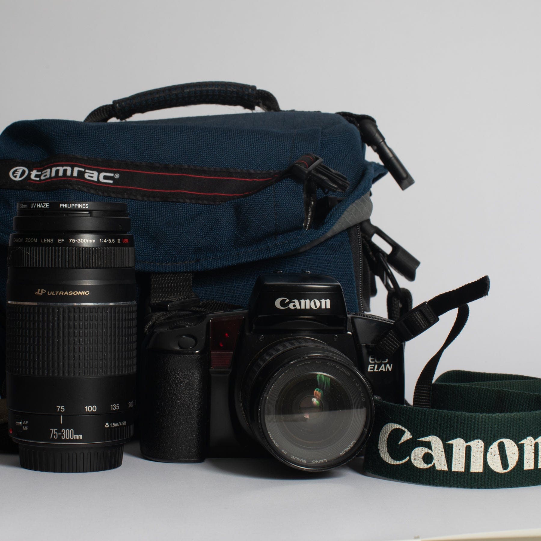 Canon EOS ELAN with 28-80 f/3.5-5.6 II, 75-300 f/4-5.6 III, Bag and Strap