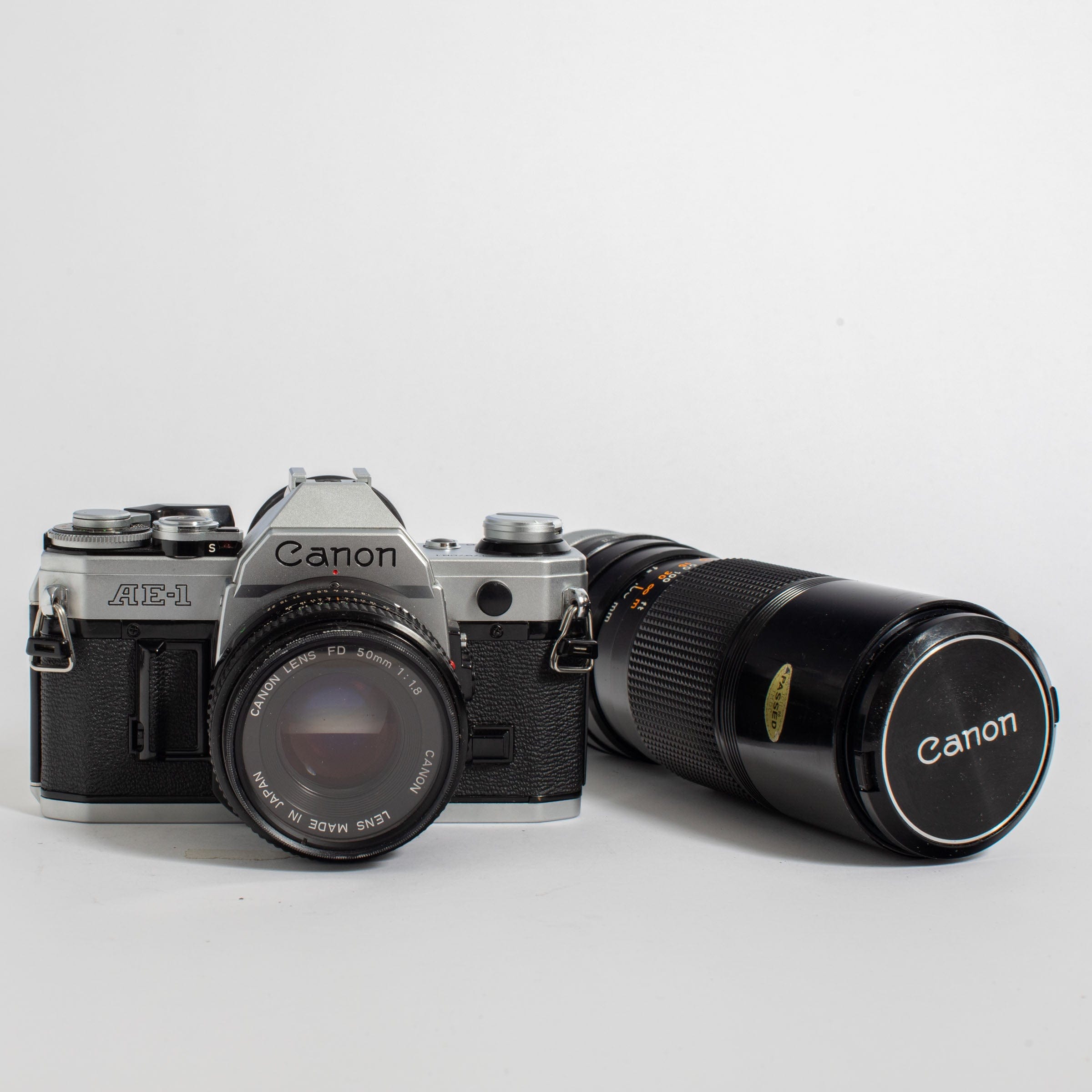 Canon AE-1 with 50mm FD f/1.8 Lens and Canon FD 100-200mm f
