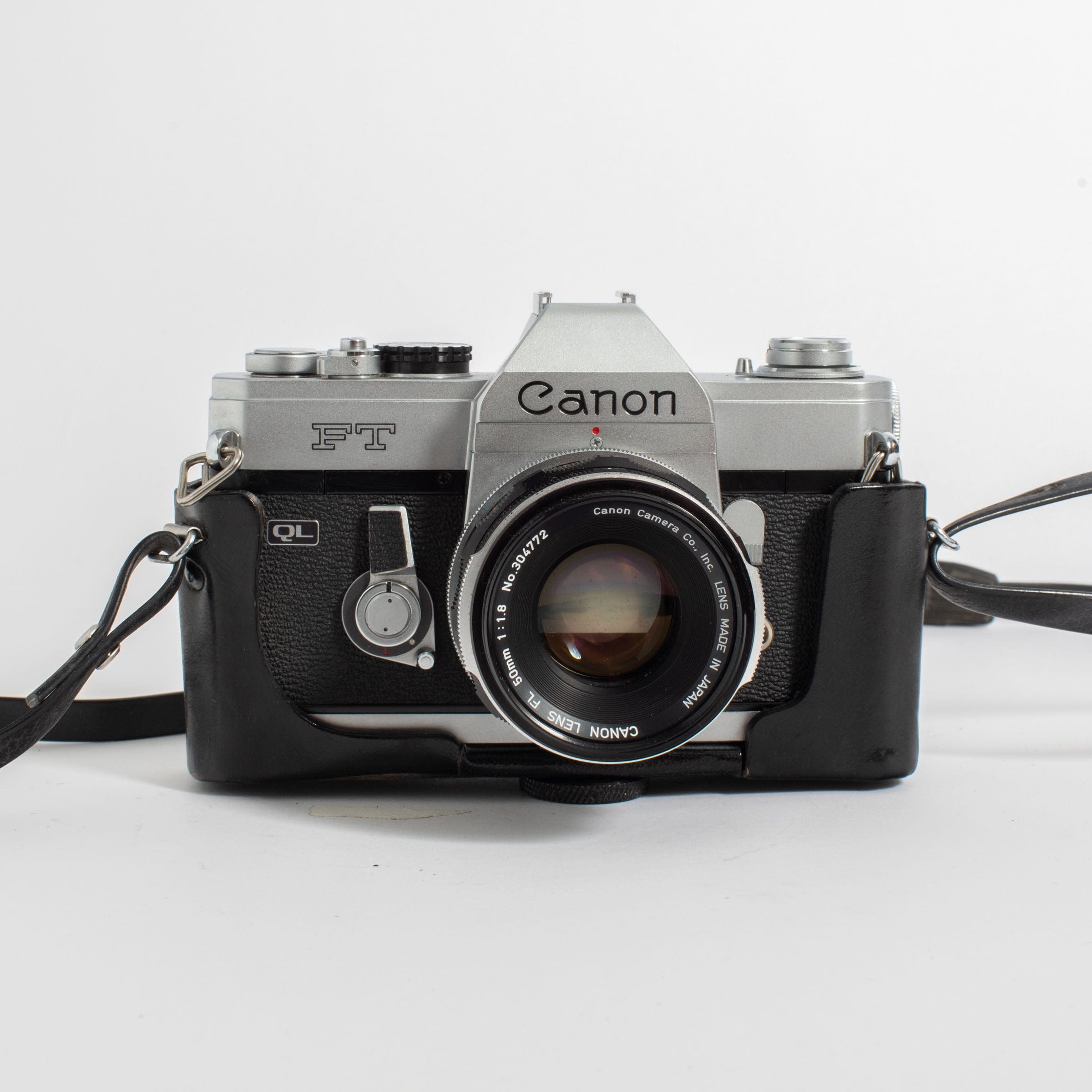 Canon FT QL w/ FL 50mm f/1.8 lens, leather casing, and strap – Film Supply  Club