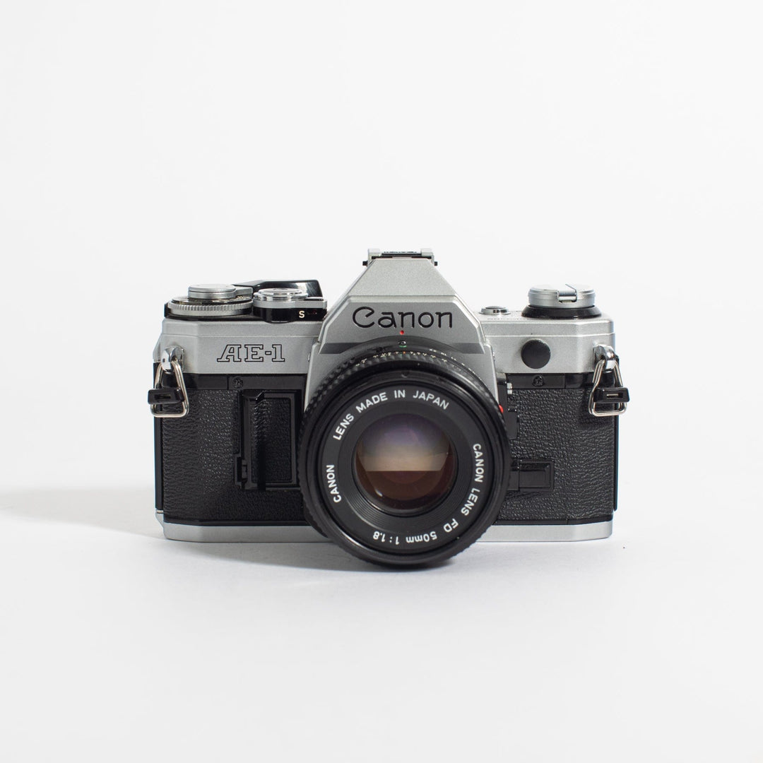 Canon AE-1 w/ 50mm FD f/1.8 and bonus telephoto zoom lens, body no. 1569485