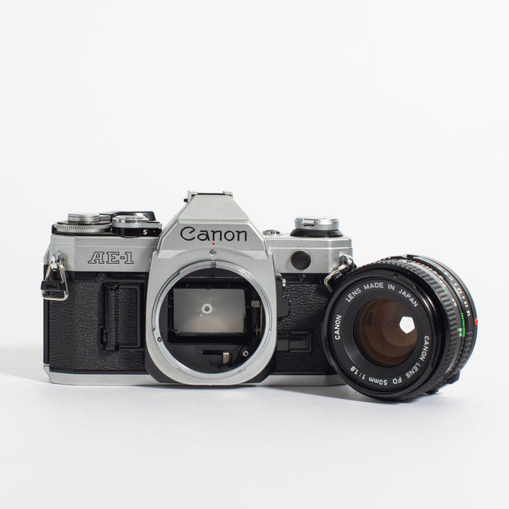 Canon AE-1 w/ 50mm FD f/1.8 and bonus telephoto zoom lens, body no. 1569485