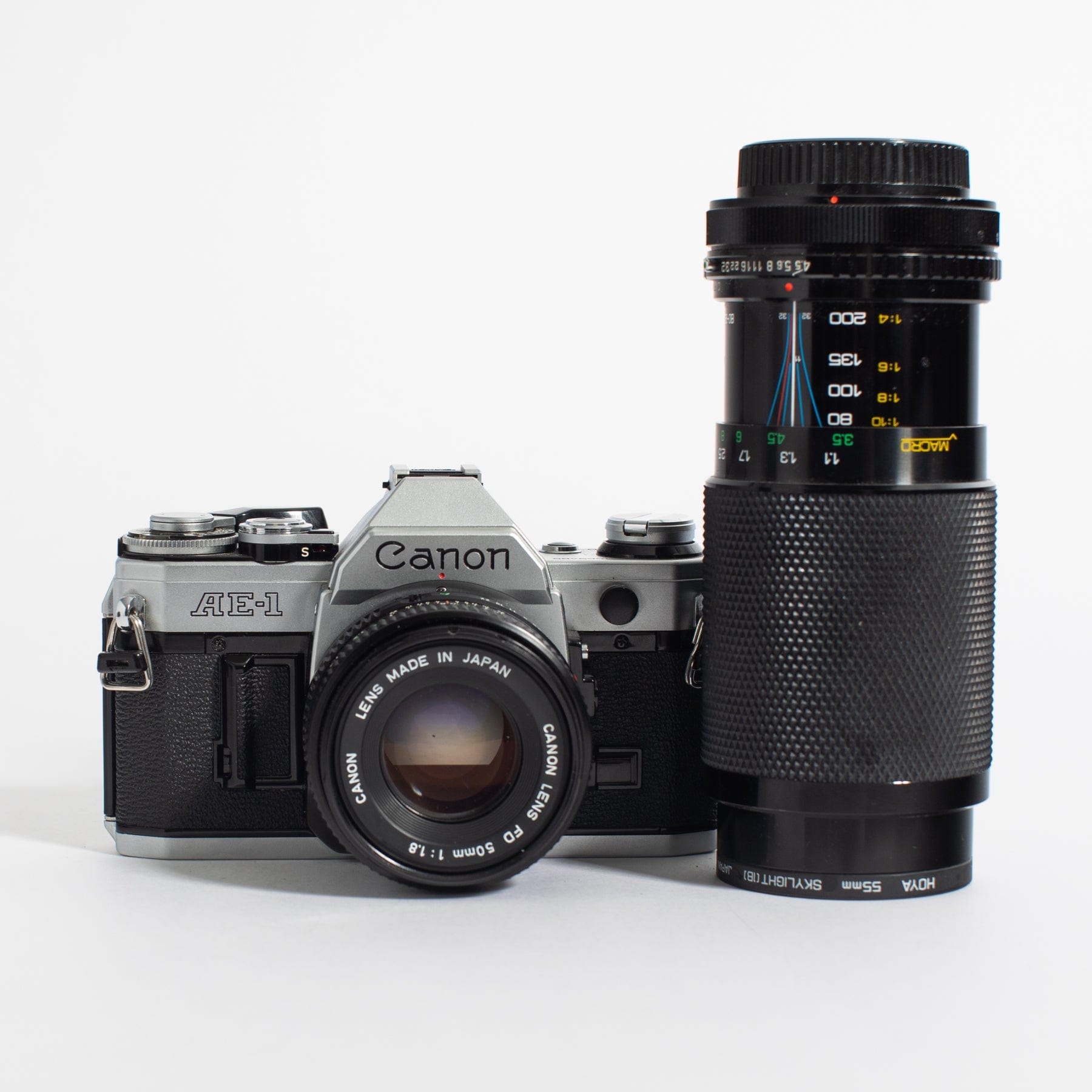 Canon AE-1 w/ 50mm FD f/1.8 and bonus telephoto zoom lens, body no