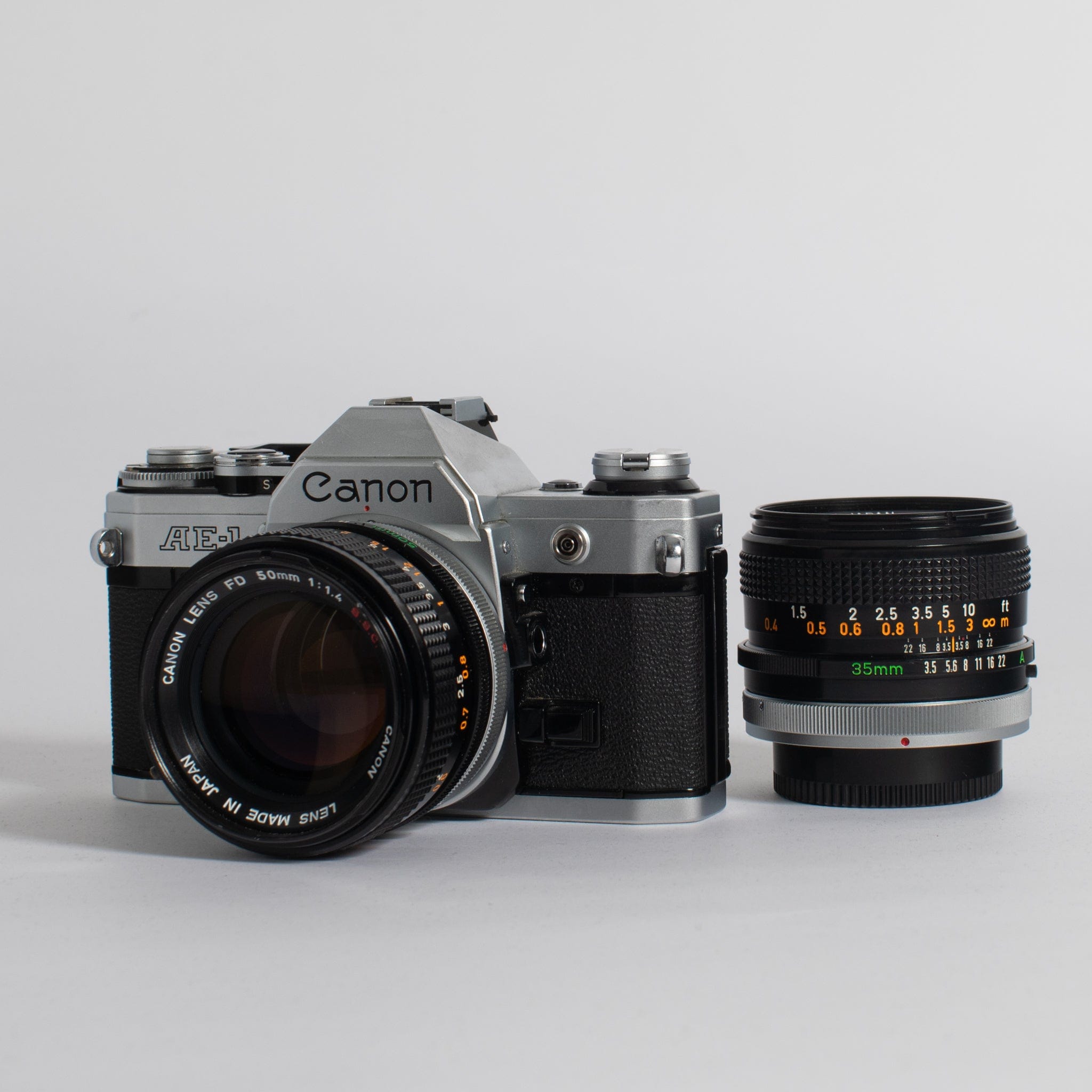 Canon AE-1 with 50mm f/1.4 and 35mm f2.8 lenses – Film Supply Club