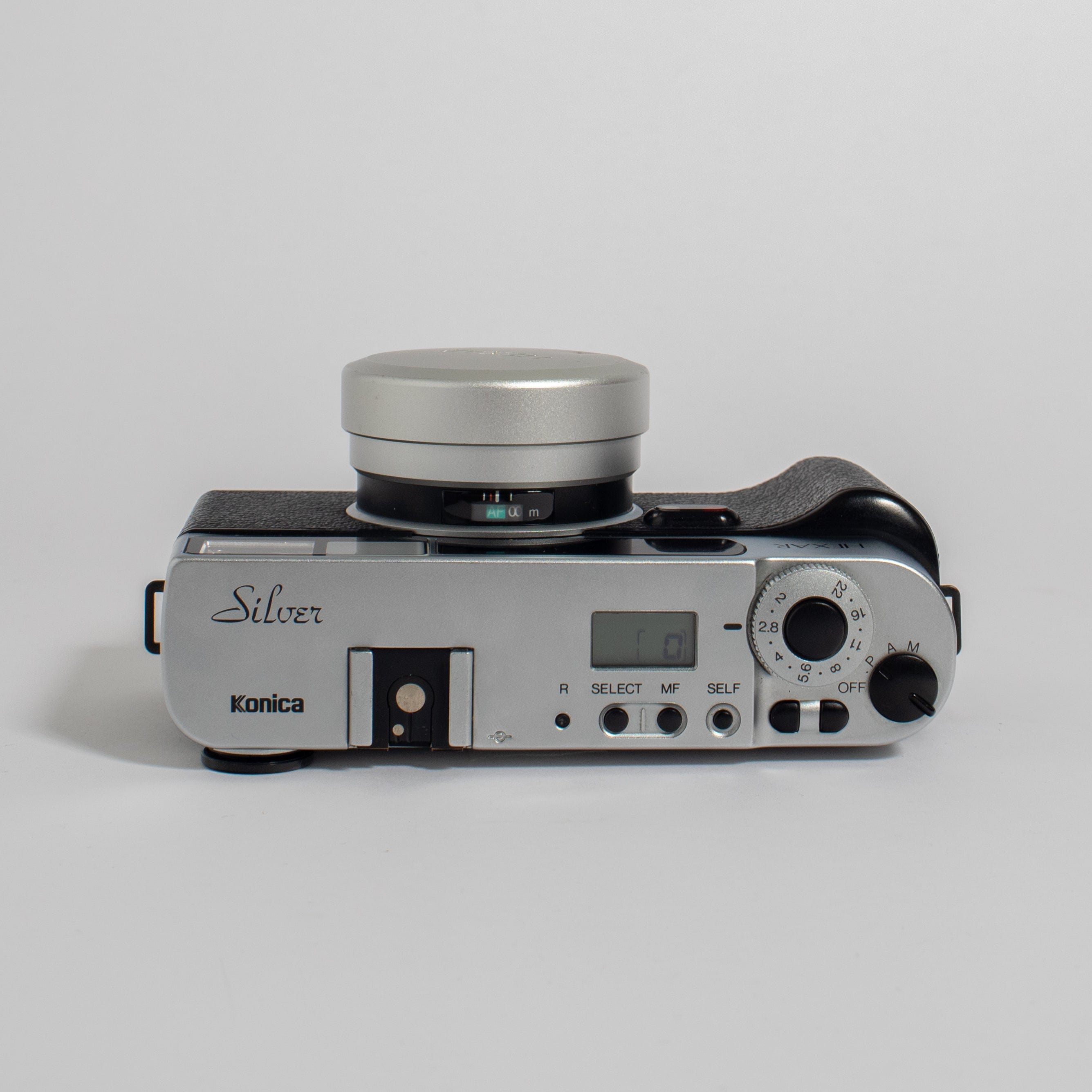 Konica Hexar Silver with 35mm f2 lens, leather case, and strap ...
