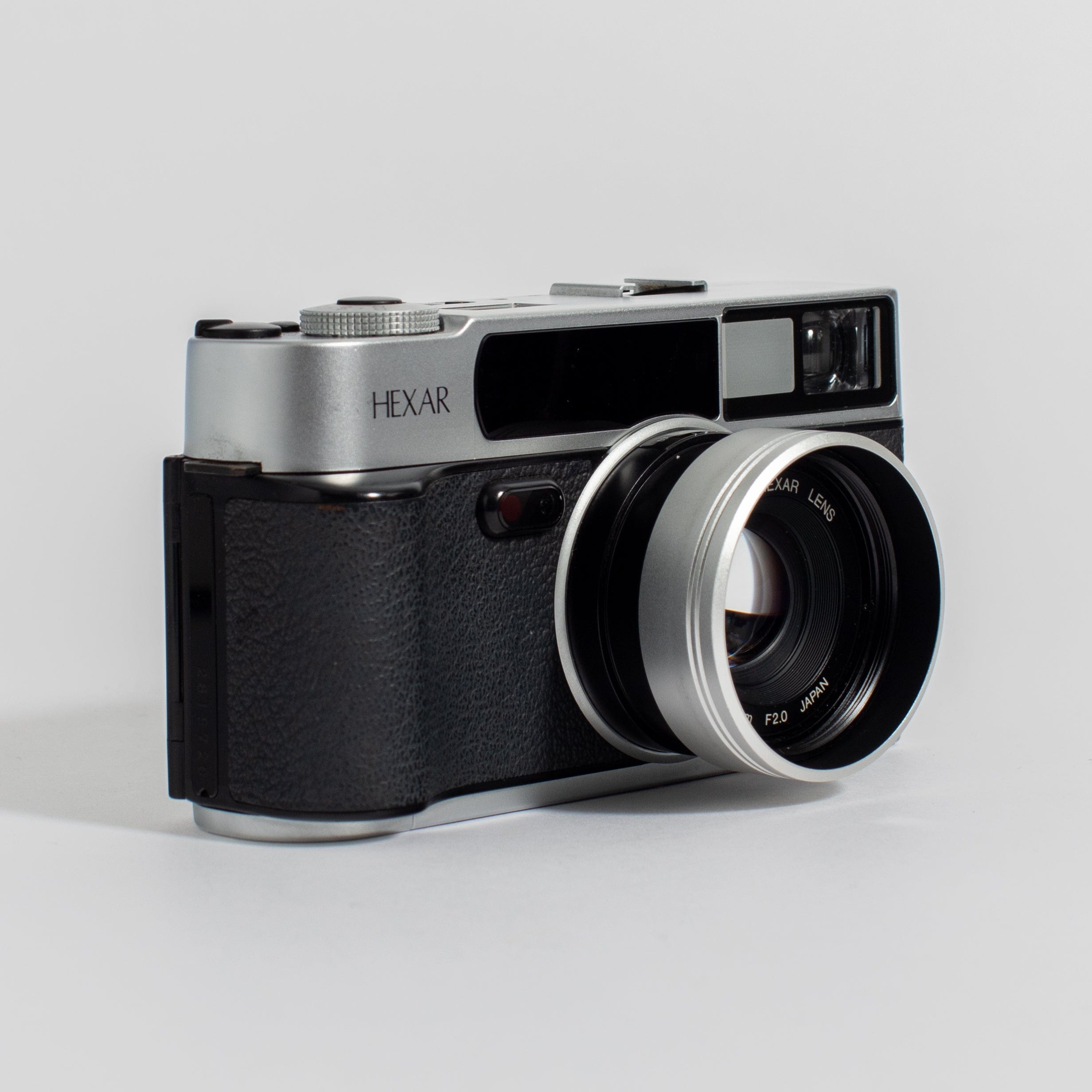 Konica Hexar Silver with 35mm f2 lens, leather case, and strap 