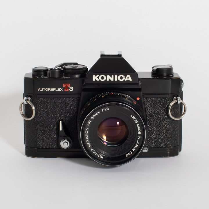 Konica Autoreflex T3 with 50mm f/1.8 and 135mm f/3.2 KIT