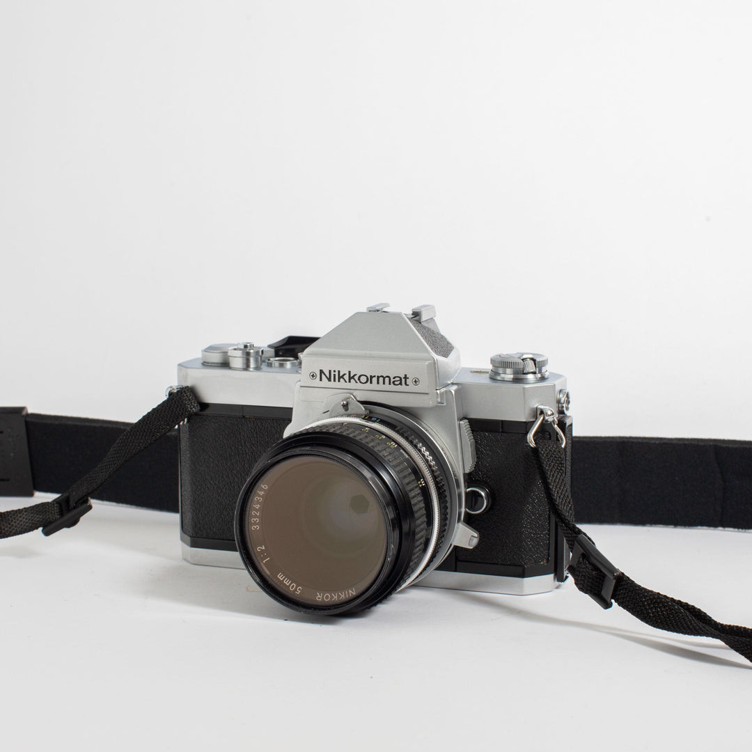 Nikkormat FT2 with Nikkor 50mm f/2 Lens and camera strap