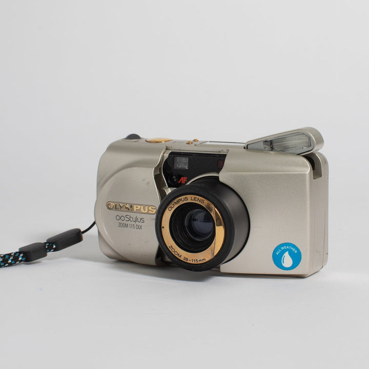 Olympus Stylus Zoom 115 DLX with 38-115mm lens with strap