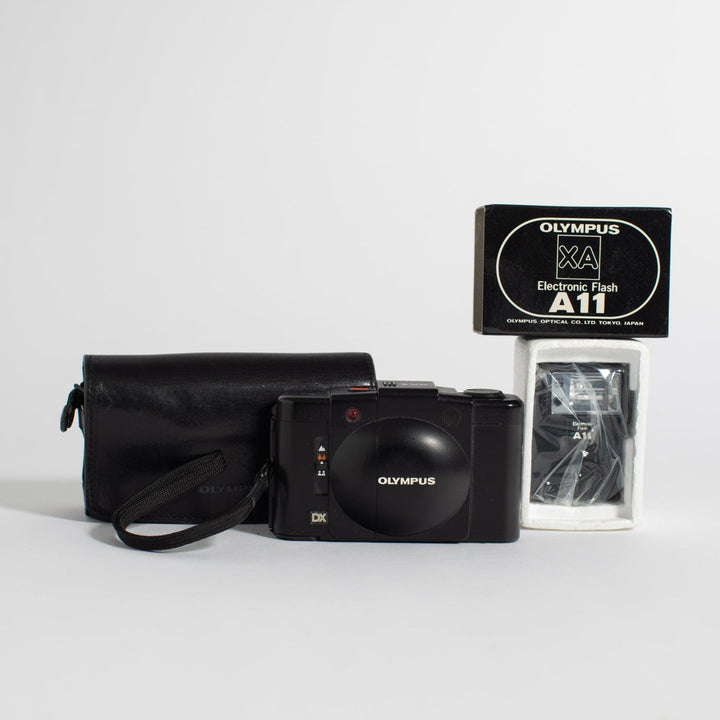 Olympus XA3 with camera pouch and A11 flash in original flash packaging